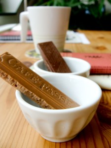 White chocolate with rooibos tea in front and milk chocolate with Sencha